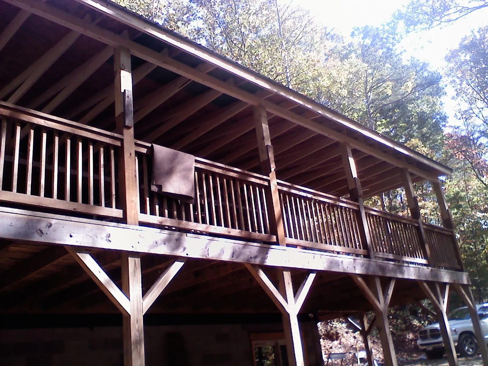 Timber framing under a new elevated porch and deck — Roof Leak Repair in Riceboro by Roofing Brothers
